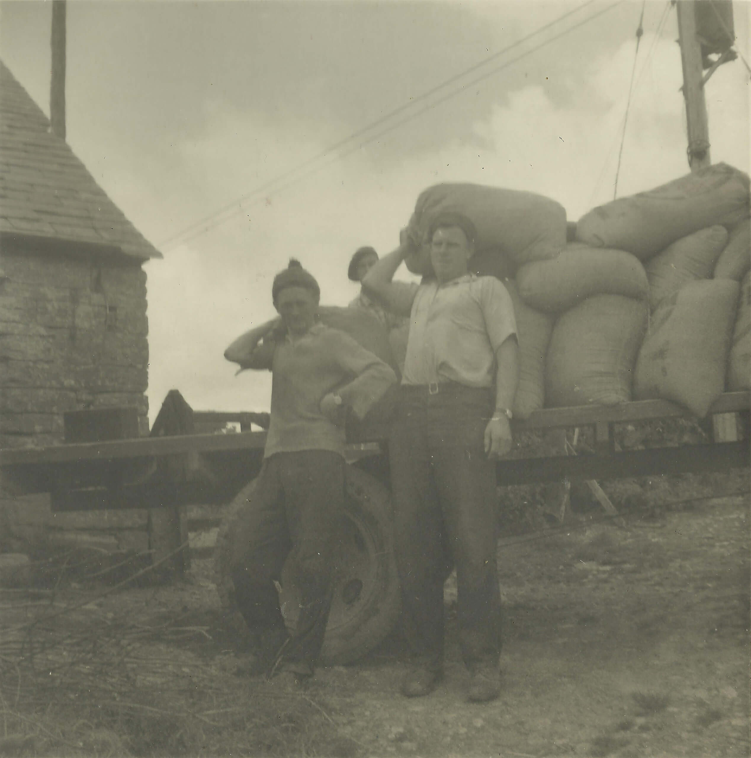 George unloading corn sacks in harvest 1962